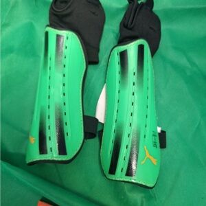 NWT Puma Adreno Green and Black Shin Guards